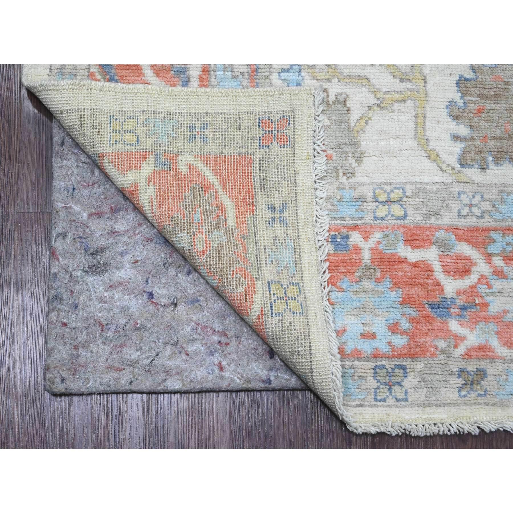 Alabaster White, Afghan Angora Oushak with Colorful Leaf Design, Hand Knotted, Vegetable Dyes, 100% Wool, Oriental Rug
Primary materials: Wool 
Latex: No Pile 
height: 0.25 Inches
Style: Transitional
Primary color: Ivory
Secondary colors: Yellow,