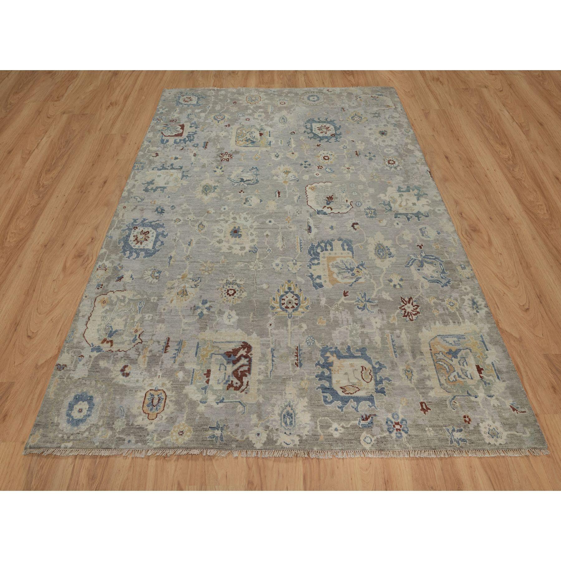 Agate Gray, Oushak with Broken Pattern, Borderless, 100% Wool, Hand Knotted, Densely Woven, Oriental Rug
Primary materials: Wool
Latex: No Pile 
height: 0.25 Inches
Style: Transitional
Primary color: Grey
Secondary colors: Blue, Ivory, Red,