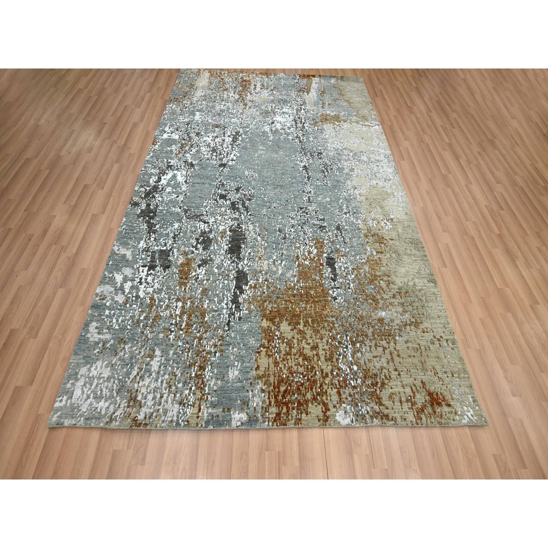 Nebliges Grau mit Braun, Persischer Knoten, Abstrakt mit Galaxie Design, 100% Wolle, Handgeknüpft, Dicht gewebt, Orientteppich
Primäre MATERIALIEN: Wolle
Latex: Kein Flor 
Höhe: 0,25 Zoll
Stil: AM Contemporary
Grundfarbe: Grau
Sekundäre Farben: