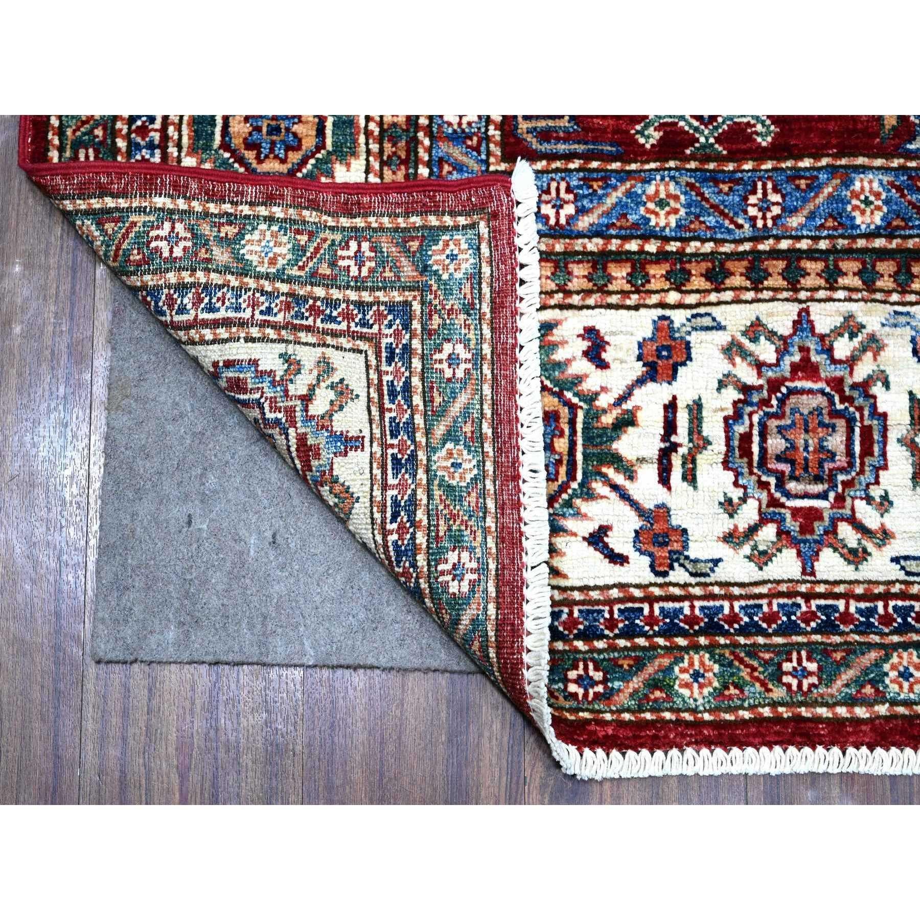 This is a truly genuine one-of-a-kind Afghan Super Kazak, Hand Knotted, Pure Wool, Oriental Rug. It has been Knotted for months and months in the centuries-old weaving craftsmanship techniques by expert artisans.
Primary materials: Wool
Latex: No