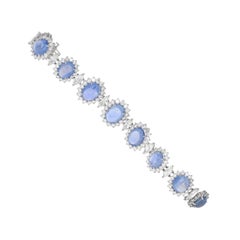 62 Carat, Blue Sapphire Cabochon and Diamond Retro Bracelet