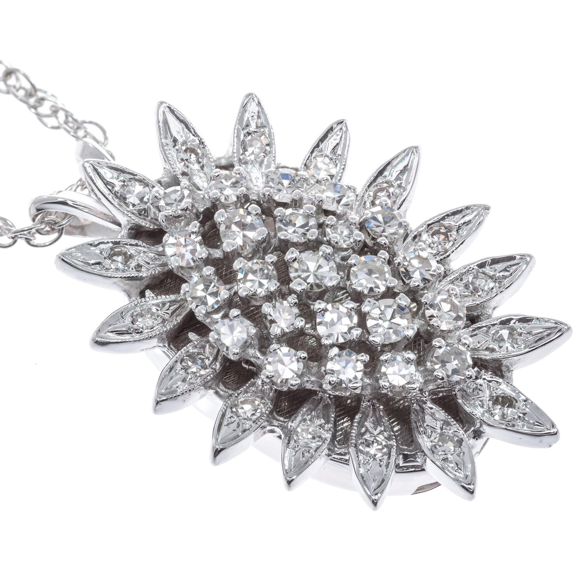 1950’s Round diamond pendant necklace. Pineapple design in 14k white gold with round diamond cluster center and a halo of round diamonds. 

39 single cut I-J SI diamonds, Approximate .62 total carat weight 
14k white gold 
Total Chain Length: 20