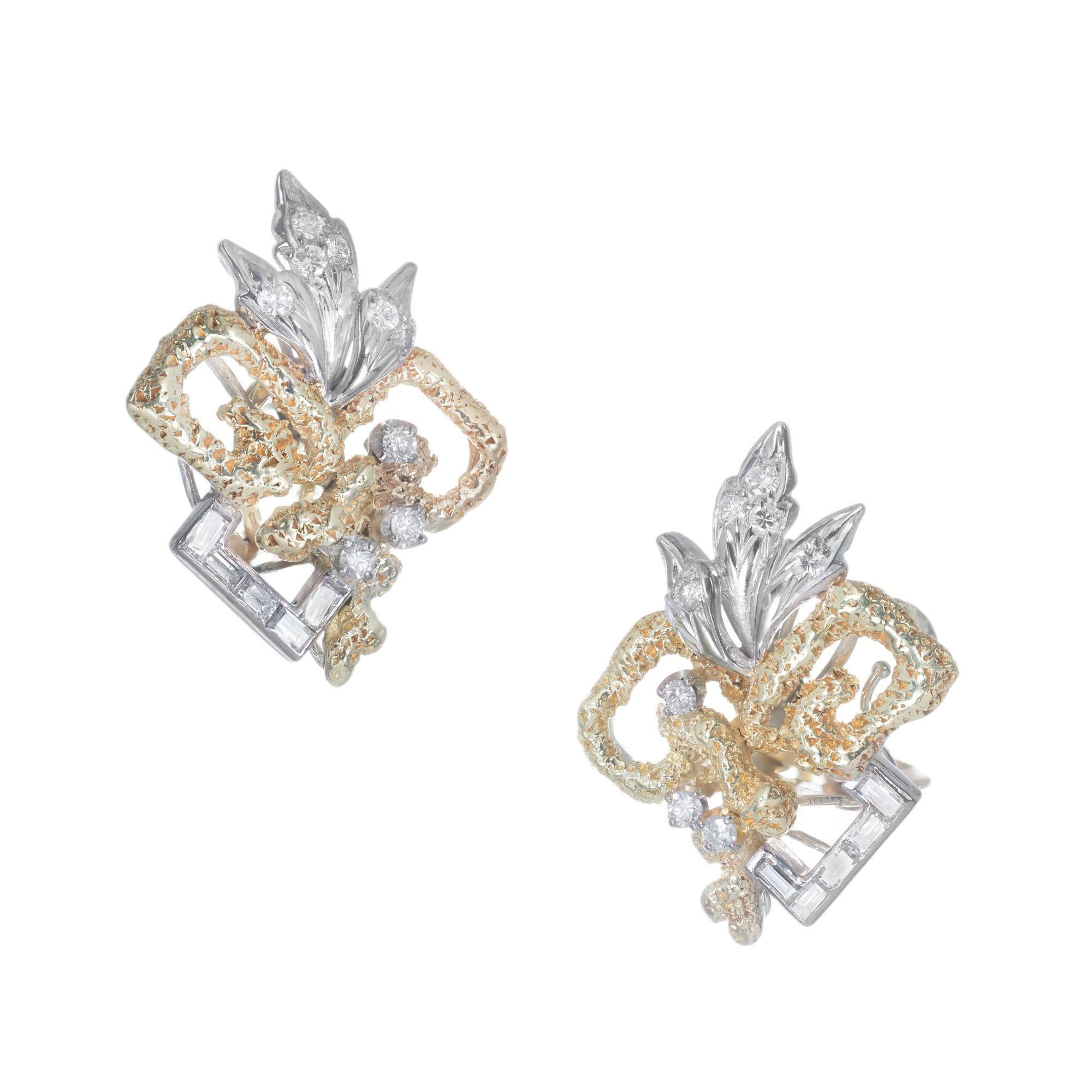 1970's 14k yellow and white gold clip post free form earrings, accented with baguette and round cut diamonds.

18 round brilliant cut diamonds, H-I VS-SI approx. .32cts
10 straight baguette cut diamonds, I VS-SI approx. .30cts
14k yellow gold 
14k