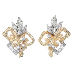 Boucles d'oreilles à clip en or jaune et blanc avec diamants de 0,62 carat