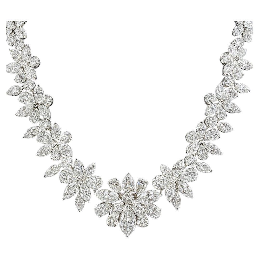 Marquise & Round Diamond Graduated Tennis Necklace

This stunning graduated tennis necklace is handcrafted in 18k white gold and set with an impressive total of 62 carats of natural diamonds. The piece is in brand-new condition and weighs 40.40