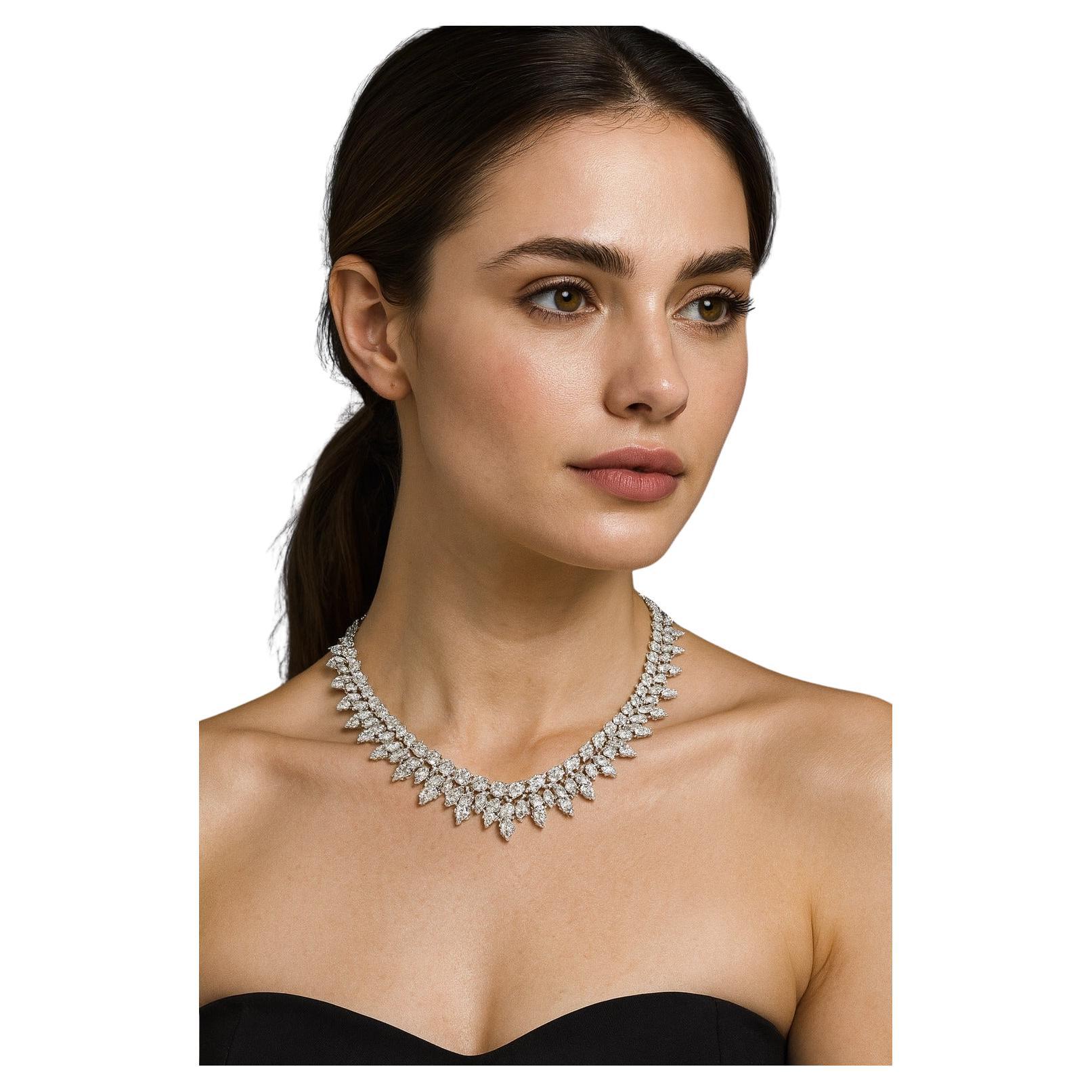 Marquise, Round & Princess Cut Diamond Graduated Tennis Necklace

This exquisite necklace is crafted in 100% natural 18k white gold and presented in brand new condition. Showcasing an impressive total diamond weight of 62 carats, it is a true