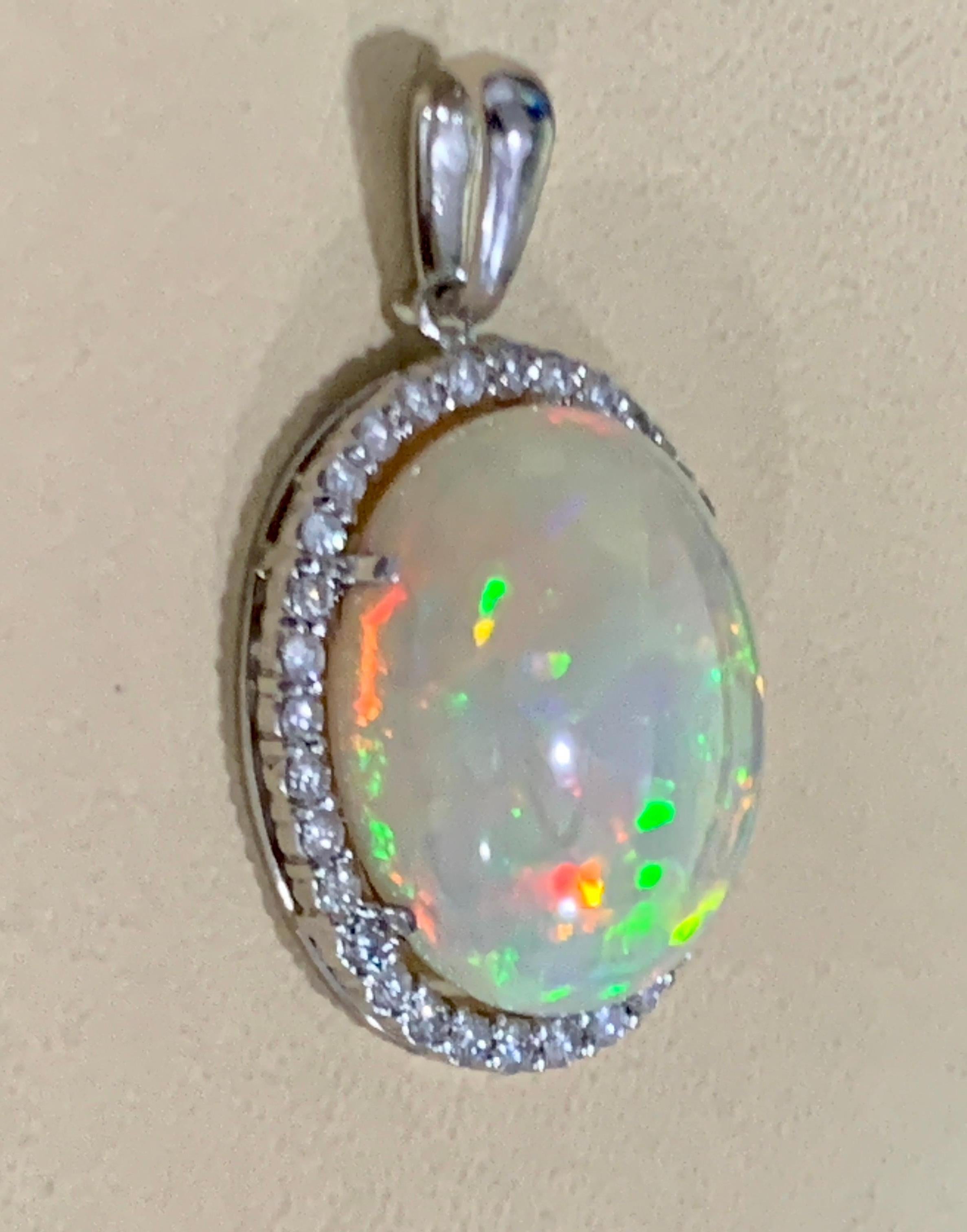 62 Carat Oval Ethiopian Opal and 3 Carat Diamond Pendant/Necklace 14K White Gold In New Condition In New York, NY
