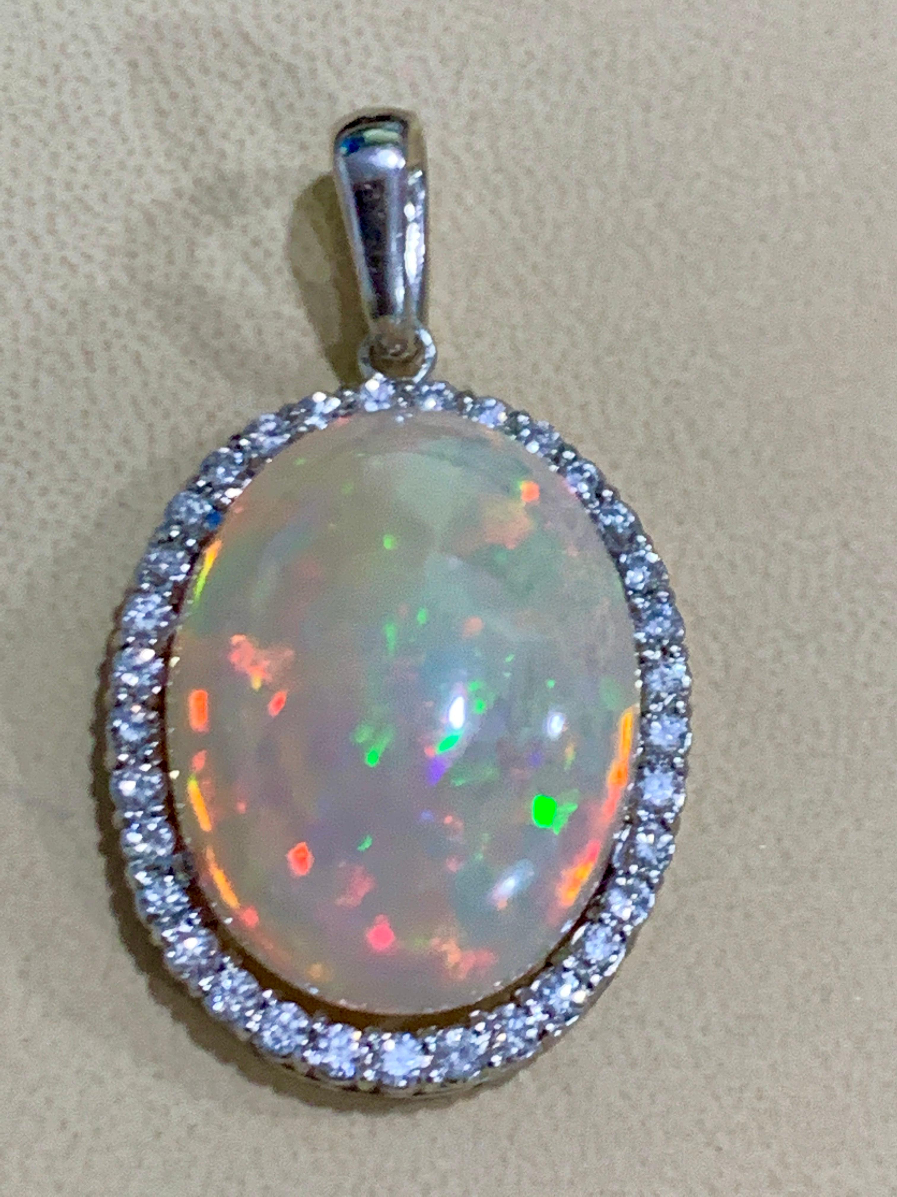 62 Carat Oval Ethiopian Opal and 3 Carat Diamond Pendant/Necklace 14K White Gold 1