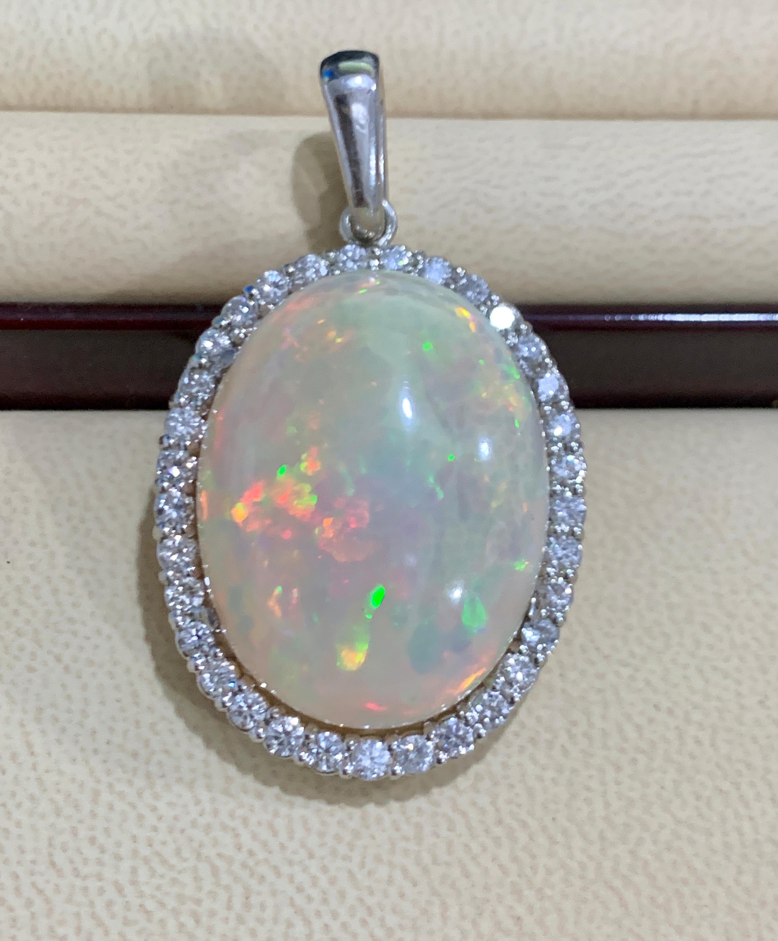 62 Carat Oval Ethiopian Opal and 3 Carat Diamond Pendant/Necklace 14K White Gold 3
