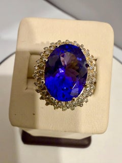 6.2 Carat Oval Tanzanite & 1 Ct Diamond Ring 14 Karat Yellow Gold, Estate, S 7