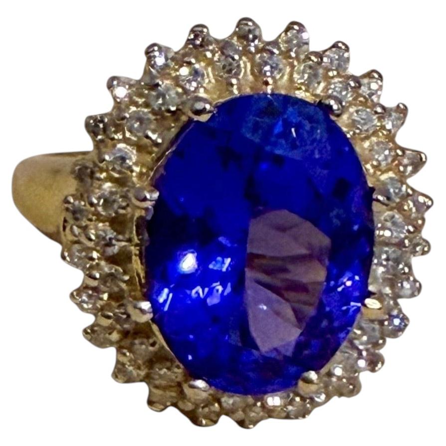 6.2ct Oval Tanzanite & 1ct Diamond Ring in 14k Yellow Gold