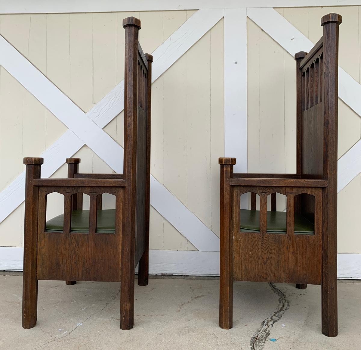 Extra tall arts and crafts armchairs from the late 1800s or early 1900s, build in solid wood, beautiful faceted pillars and finials, upholstered in green vinyl.

The chairs are solid, heavy and extremelly well built.

Measurements;
62 inches