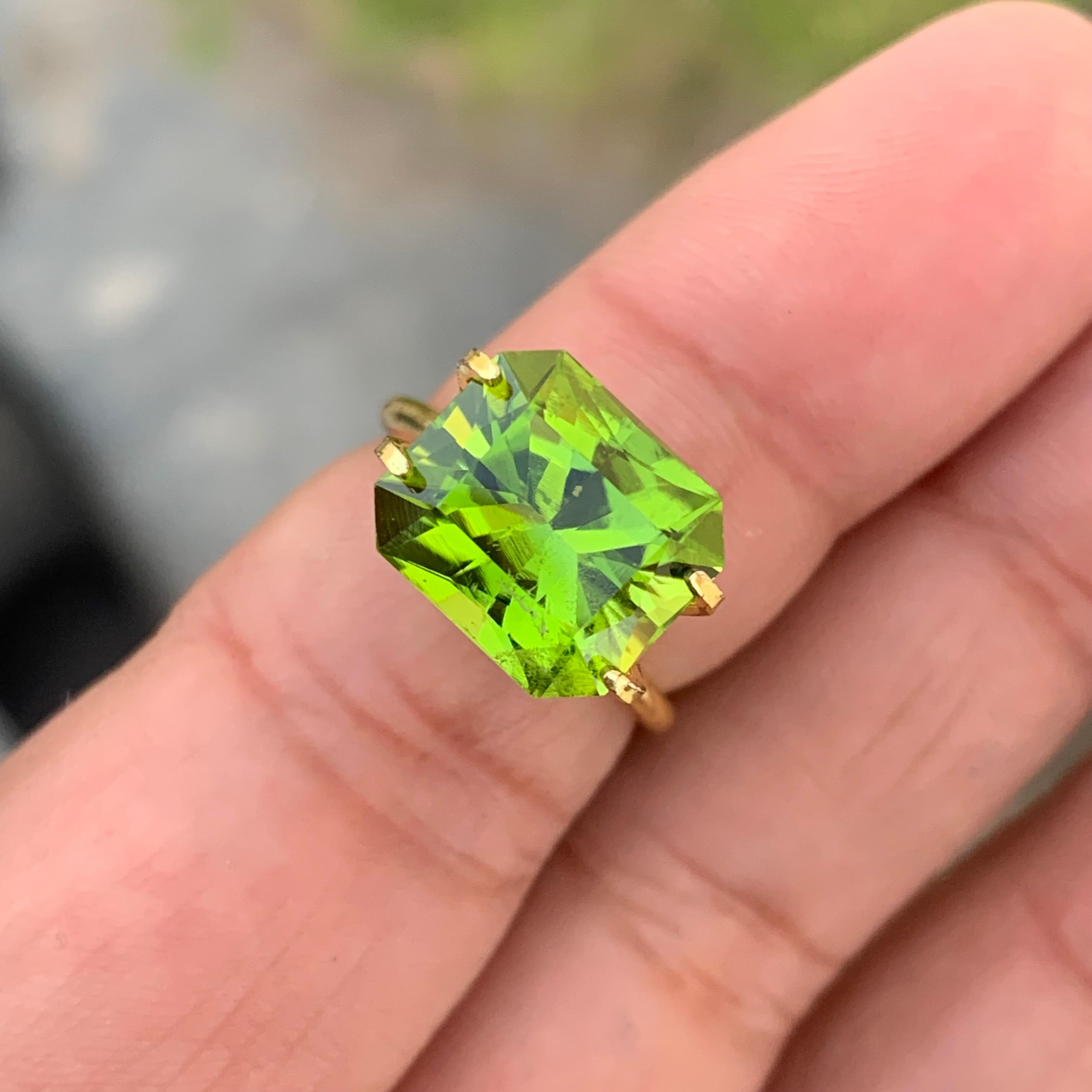 6.20 Carat Emerald Shape Precision Cut Faceted Apple Green Peridot  In New Condition In Peshawar, PK