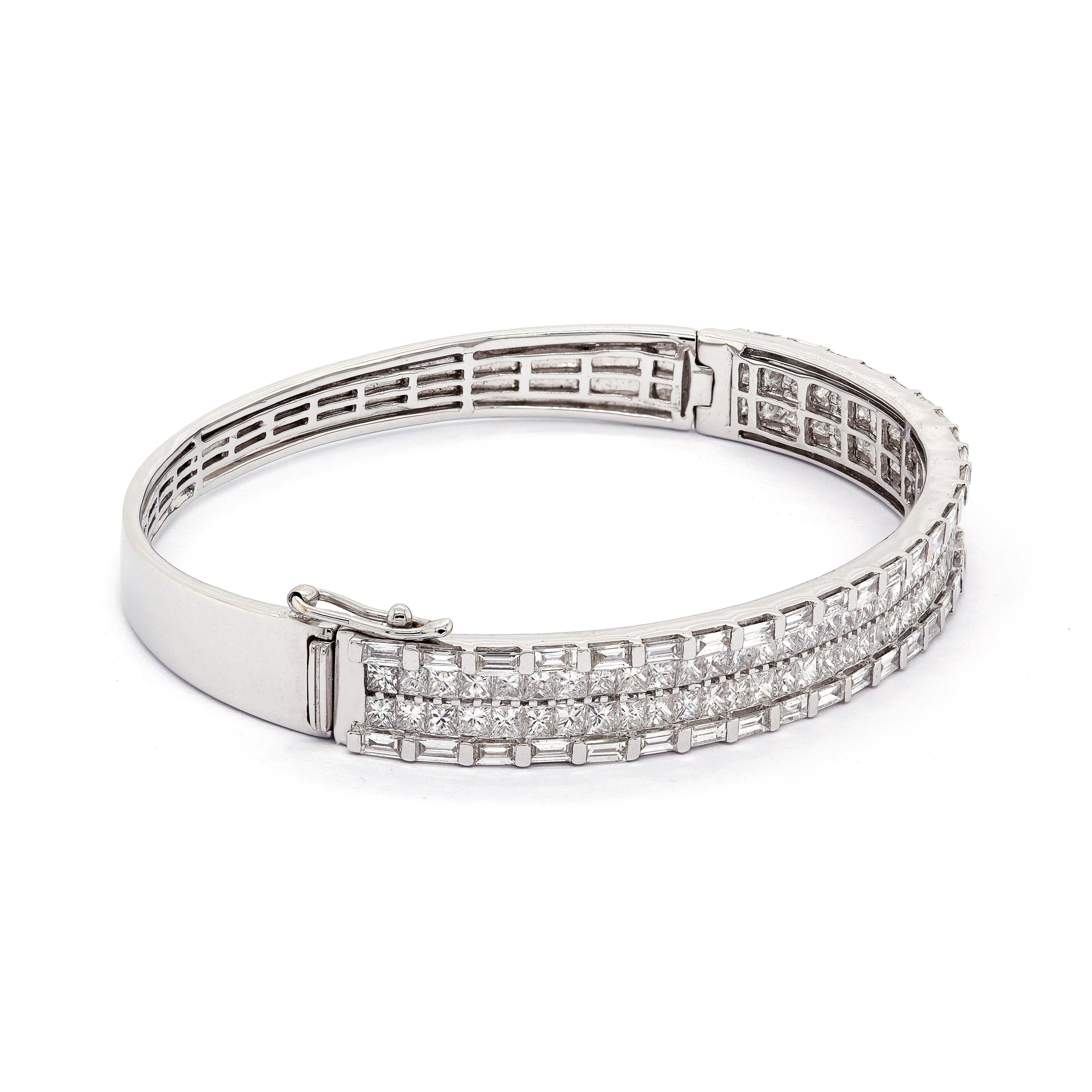 This stunning modern diamond bracelet will not only take your breath away, but will also light up any ensemble. 6.20 carat of brilliant princess-cut diamonds are perfectly set to form a one of a kind look. 

Diamond: 6.20 Carat
18K White Gold: 20.42