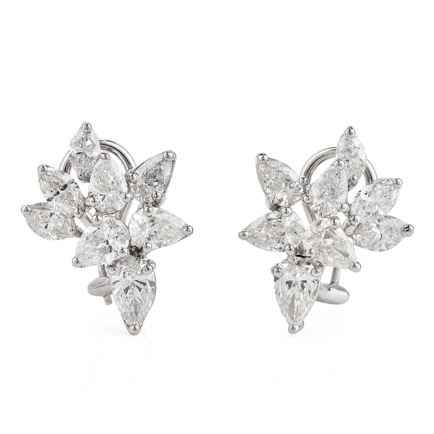 Add some gleaming beauty to your life with these elegant Diamond Platinum Pear-shape, Marquise-cut,  Cluster Clip Back Platinum Earrings!  

These alluring earrings boast 18 genuine natural diamonds with marquise and pear shape totaling  6.20 carats