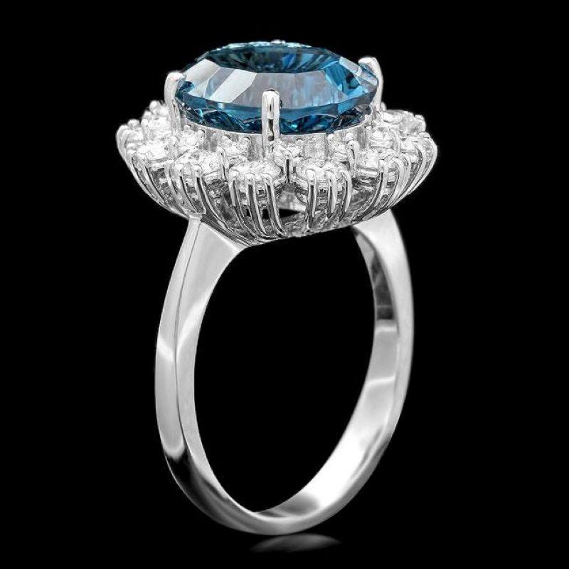 6.20 Carats Natural Blue Topaz and Diamond 14K Solid White Gold Ring

Total Natural Blue Topaz Weight is: Approx. 5.50 Carats 

Blue Topaz Measures: Approx. 12.00 x 9.00mm

Natural Round Diamonds Weight: Approx. 0.70 Carats (color G-H / Clarity