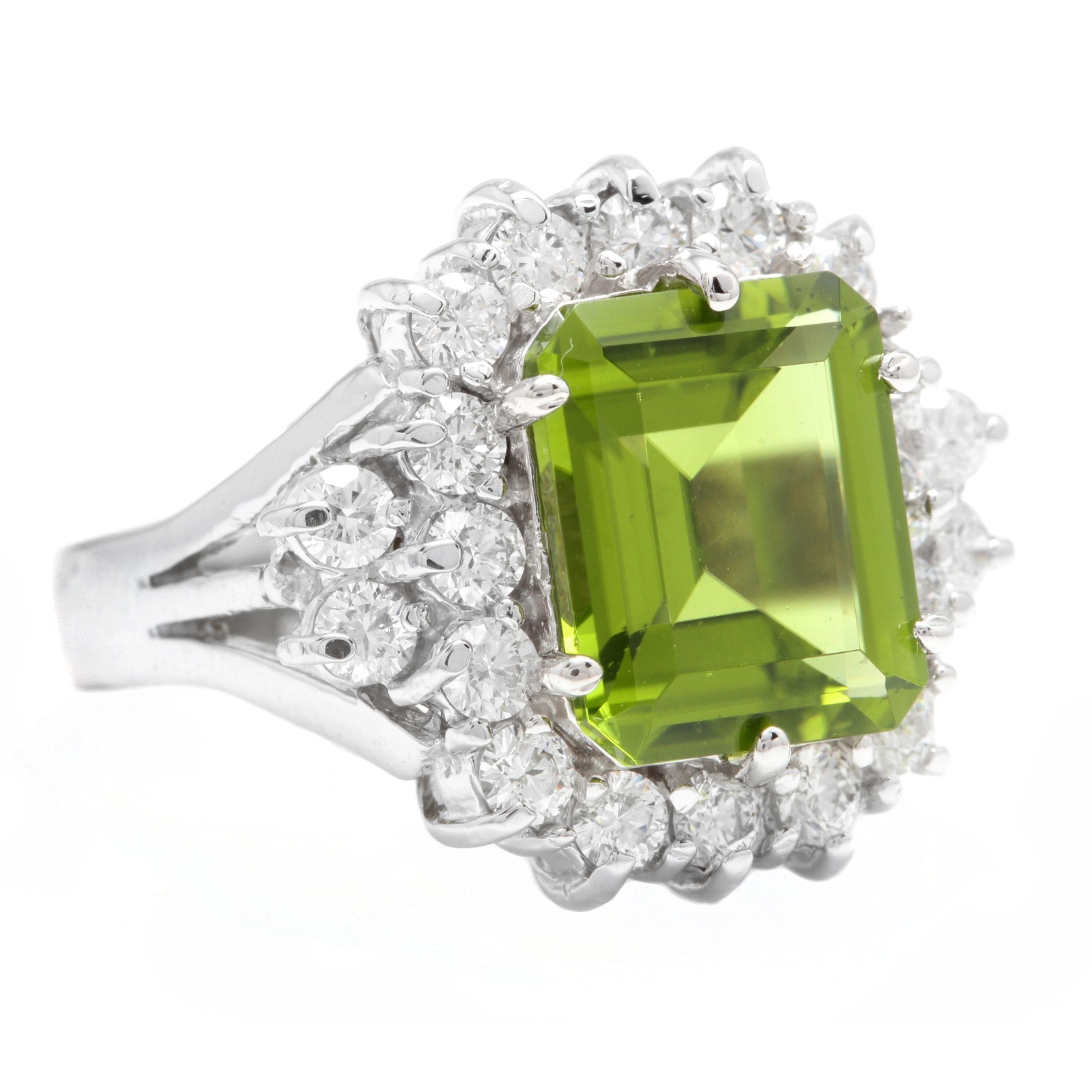 6.20 Carats Natural Very Nice Looking Peridot and Diamond 14K Solid White Gold Ring

Stamped: 14K

Total Natural Emerald Cut Peridot Weight is: Approx. 5.00 Carats

Peridot Measures: Approx. 11 x 9mm

Natural Round Diamonds Weight: Approx. 1.20