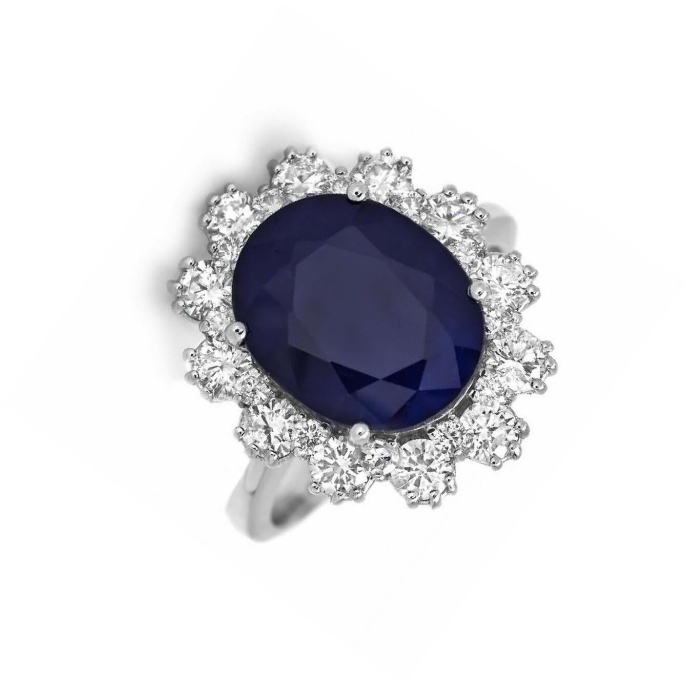 6.20 Carats Natural Sapphire and Diamond 14K Solid White Gold Ring

Total Natural Oval Cut Sapphire Weights: Approx. 5.00 Carats

Sapphire Measures: Approx. 12.00 x 10.00mm

Sapphire Treatment: Diffusion

Natural Round Diamonds Weight: Approx. 1.20