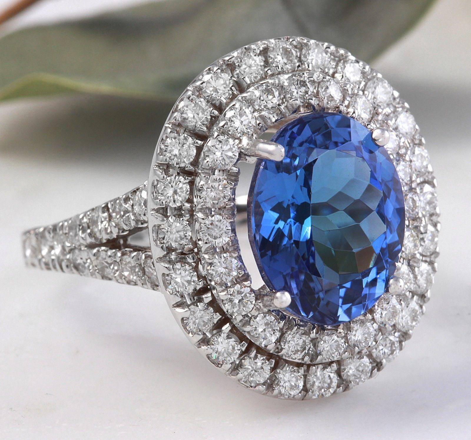 6.bague en or blanc massif 14K avec tanzanite et diamant de 20 carats de très belle qualité naturelle

Le poids total de la tanzanite ovale naturelle est de : Environ 5.00 Carats

Mesures de la tanzanite : Environ 10.00 x 8.00mm

Traitement des