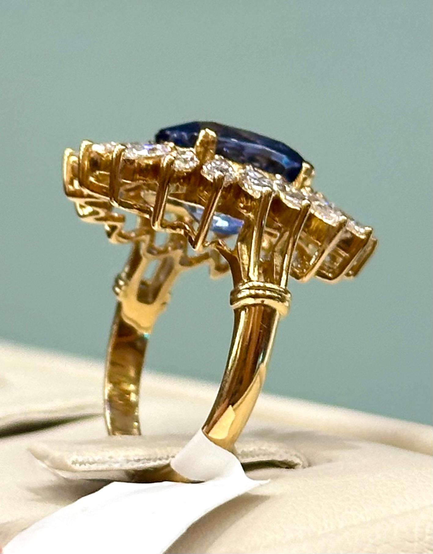Oval Cut 6.20 cts Oval Sri Lankan Heated Blue Sapphire and Diamond 18k Yellow Gold Ring For Sale