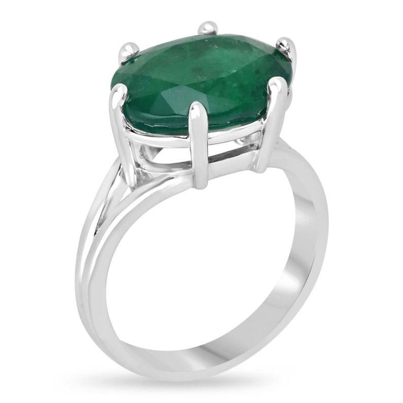 Adorn your finger with the epitome of elegance and sophistication with our solitaire emerald ring. Featuring a mesmerizing 6.20-carat natural emerald sourced from Zambia, its rich dark green hue and semi-transparent clarity captivate the eye with