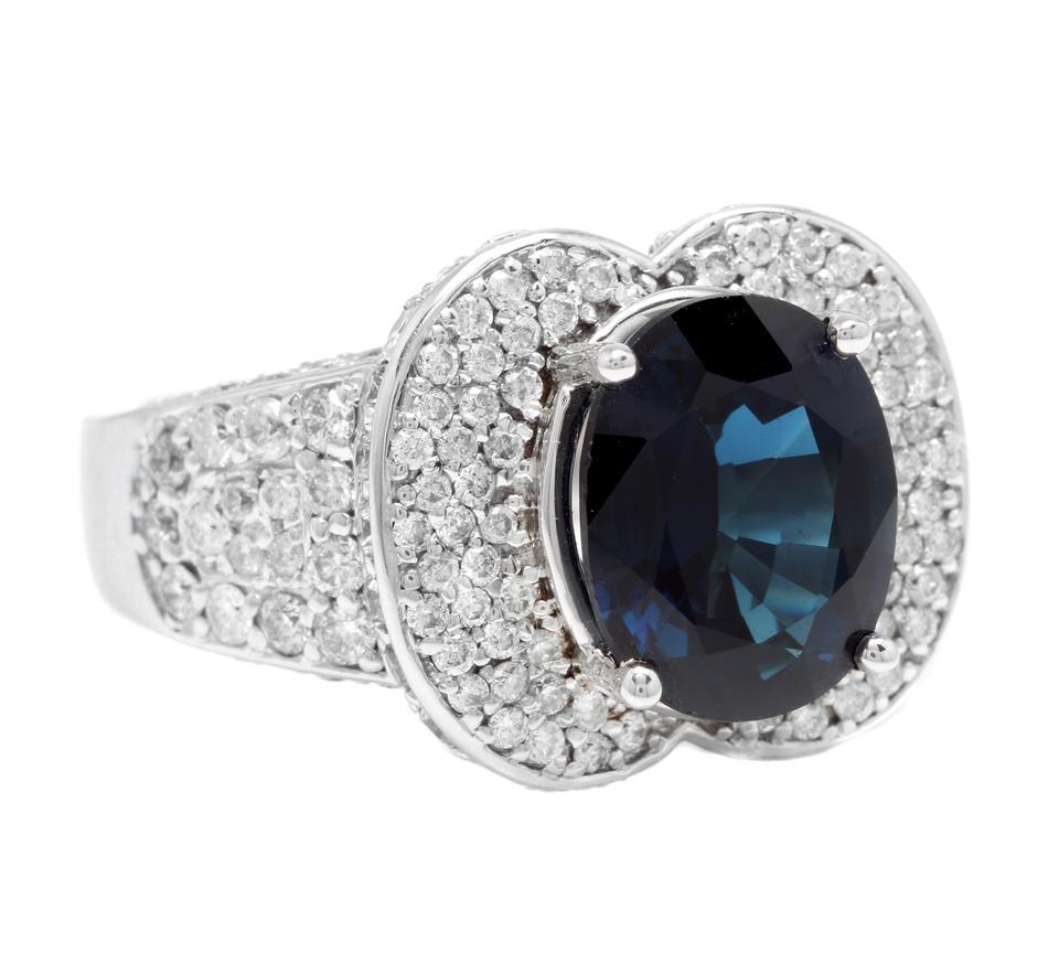 6.20 Carats Exquisite Natural Blue Sapphire and Diamond 14K Solid White Gold Ring

Suggested Replacement Value Approx. $10,000

Total Blue Sapphire Weight is: Approx. 4.50 Carats

Sapphire Measures: Approx. 11.00 x 8.50mm

Sapphire Treatment: