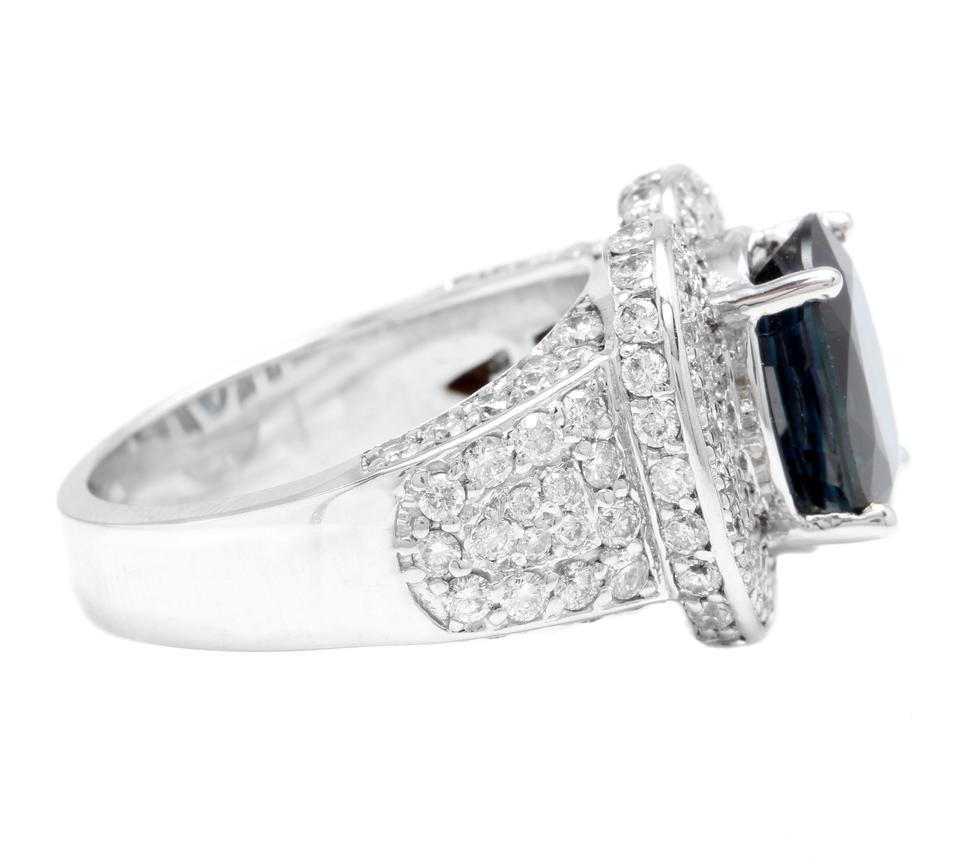 Oval Cut 6.20 Carat Natural Blue Sapphire and Diamond 14 Karat Solid White Gold Ring For Sale