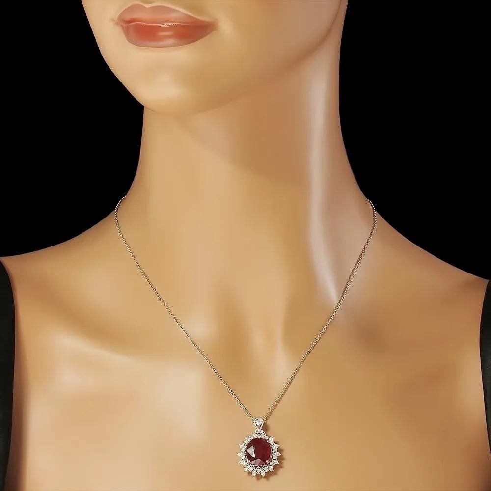 6.20Ct Natural Red Ruby and Diamond 14K Solid White Gold Pendant

Oval Cut Ruby Weight is: Approx. 5.40 Carats 

Ruby Measures: 13 x 11 mm

Ruby Treatment: Fracture Filling

Total Natural Round Diamond weights: 0.80 Carats (Color G-H / Clarity