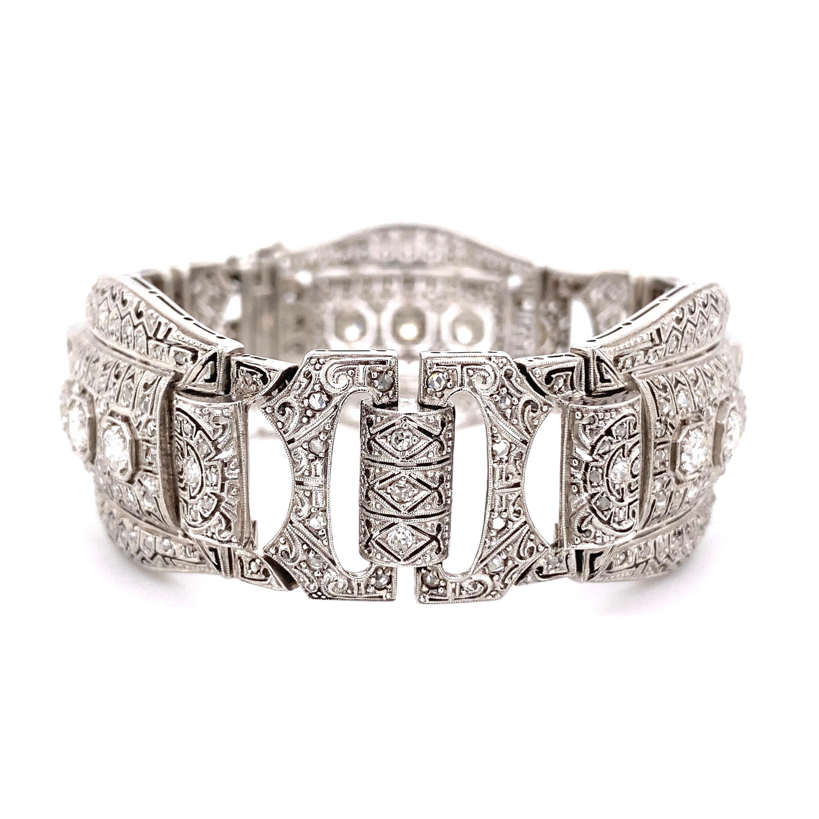 Simply Beautiful and finely detailed Art Deco Diamond Platinum Bracelet. Hand crafted Filigree 3 section design. Hand set with 234 old European cut, Rose cut and Old cut Diamonds, weighing approx. 6.20tcw. Bracelet measures approx. 7