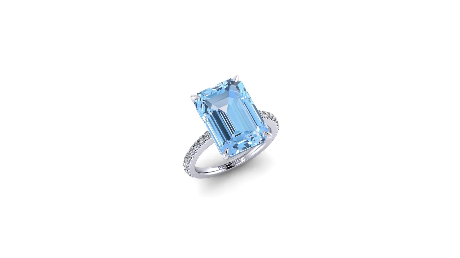 An exquisite 6.21 carat Aquamarine, emerald cut, very high quality color, eye clean gem, accompanied a pave' of bright diamonds of approximately  total carat weight of 0.38 carat, set in an hand crafted, delicate and sophisticated looking Platinum