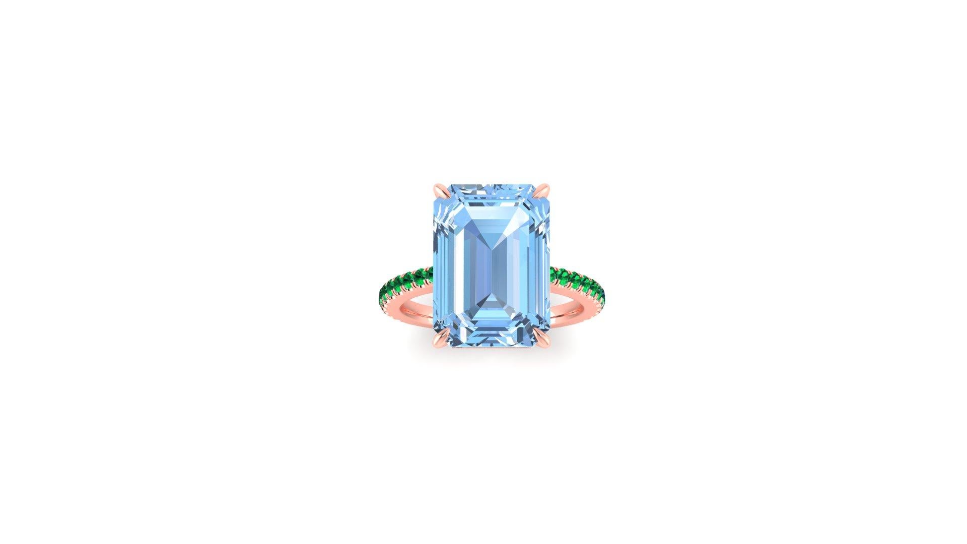  6.21 carat Aquamarine, emerald cut, very high quality color, eye clean gem, accompanied a pave' of bright green Emeralds of approximately  total carat weight of 0.35 carat, set in an hand crafted, delicate and sophisticated looking 18k rose gold,