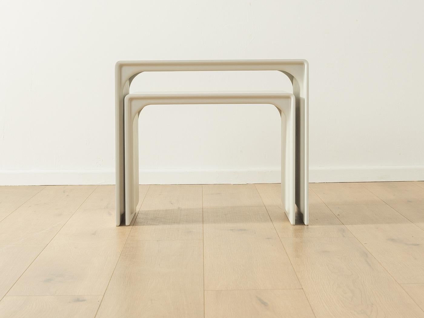 Nesting pair 621 by Dieter Rams for Vitsoe based on a draft from 1962. High-quality injection moulding plastic frame in grey white.

Quality Features:

accomplished design: perfect proportions and visible attention to detail 
high-quality