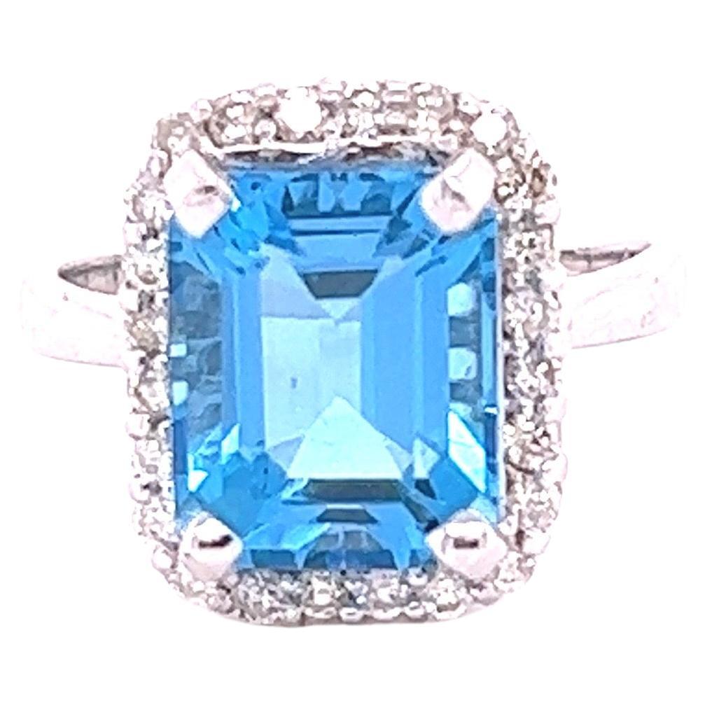 Ring aus 14 Karat Weißgold mit 6,22 Karat blauem Topas und Diamant