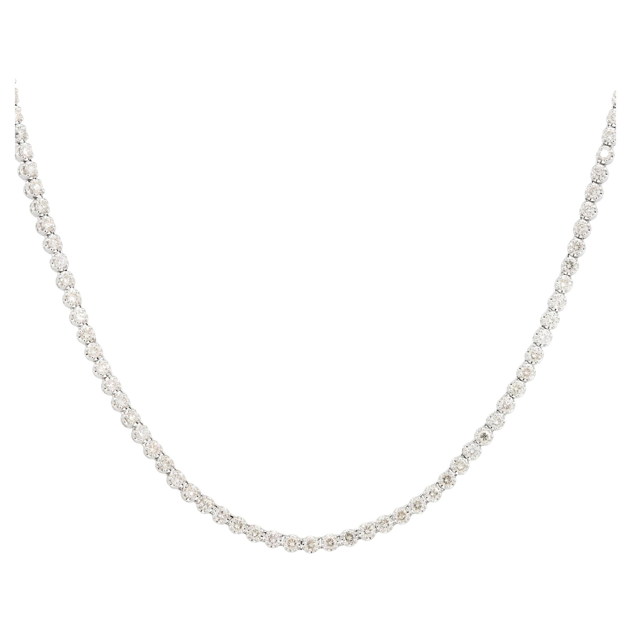 There are many reasons why this tennis necklace is so unique. There are 18.5 inches of round brilliant diamonds throughout this necklace, making it long enough to be layered with other necklaces or worn by itself. The chain is made from 14 karat
