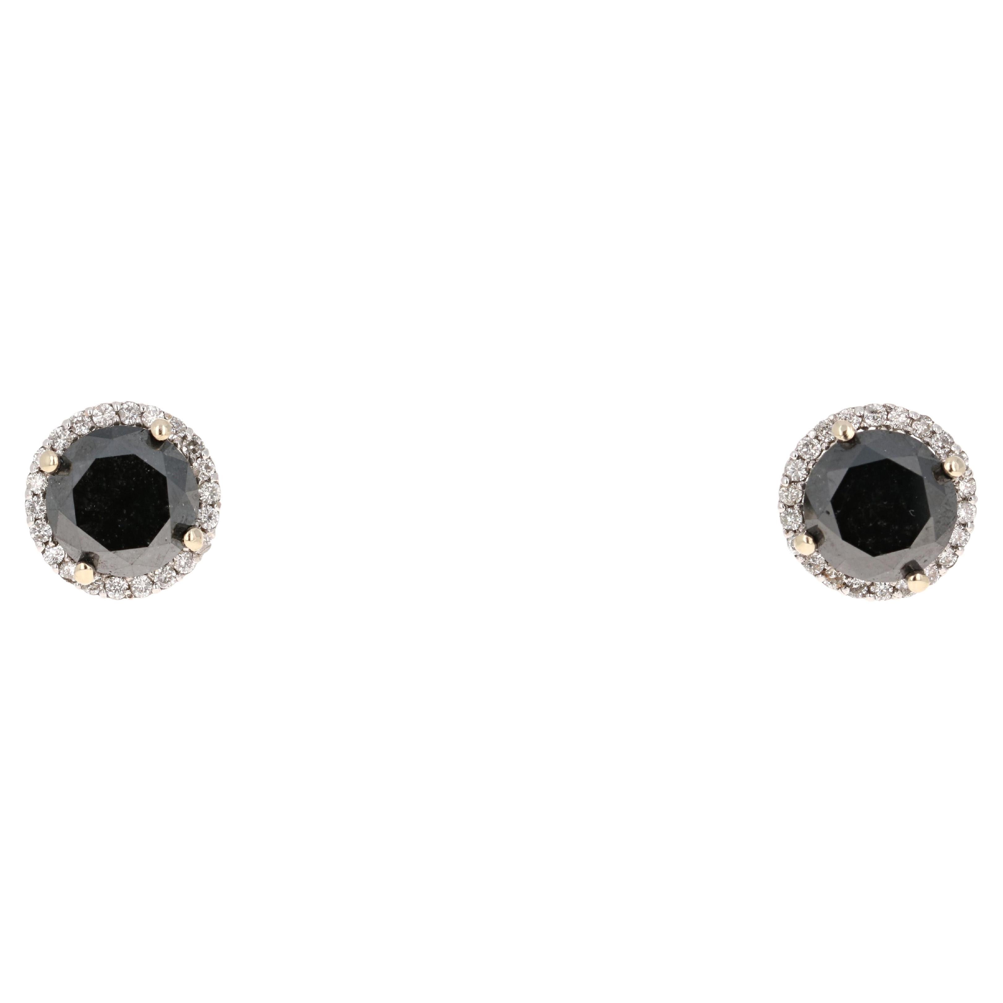 These fun & unique stud earrings have 2 Black Round Cut Diamonds that weigh 5.84 Carats and 44 Round Cut Diamonds that weigh 0.39 Carats. (Clarity: SI, Color: F) The total carat weight of the earrings are 6.23 Carats. The black diamonds measure at