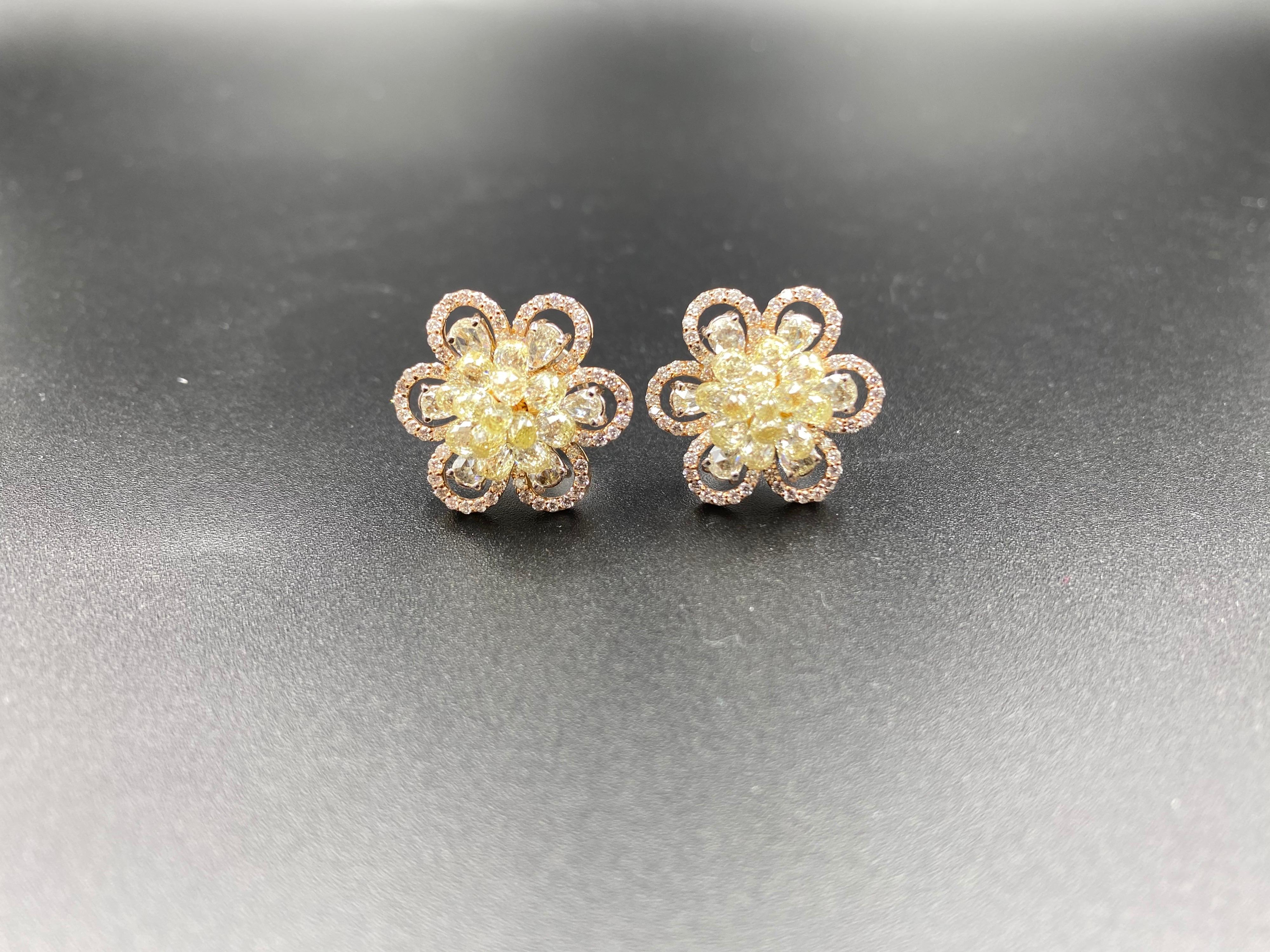 The Dusty Rose
With 5 carats of natural fancy yellow briolette centered between six rose cut diamonds, the intricate floral arrangement of The Dusty Rose earrings strikes the perfect balance between the subtle elegance of rose cut and the radiating