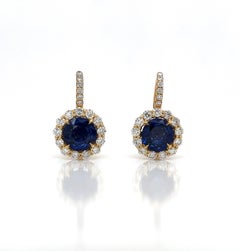 Boucles d'oreilles or 18 carats saphir bleu et diamant Halo Pave
