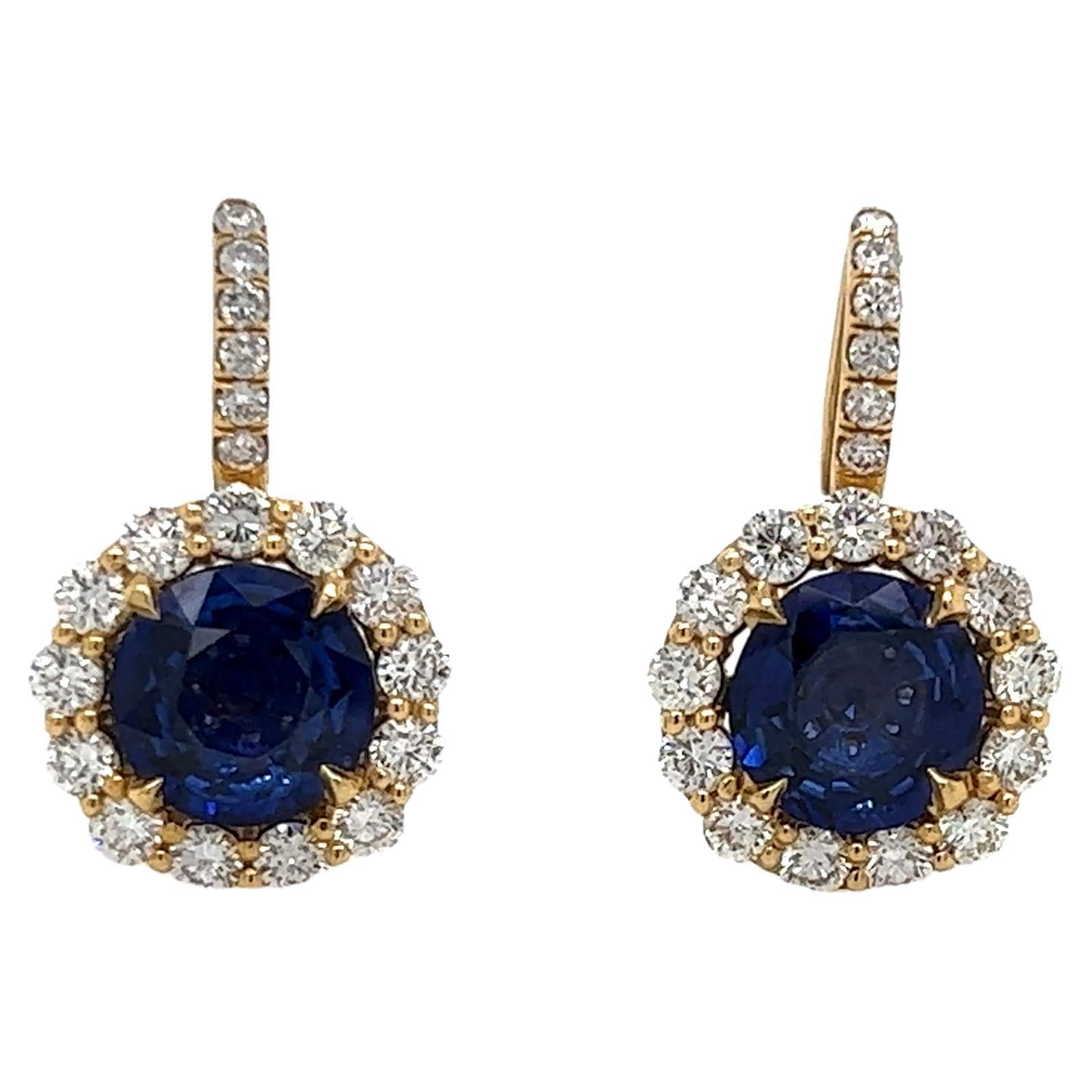 6.23 Total Carat Blue Sapphire and Diamond Halo Pave Earrings in 18K Gold For Sale