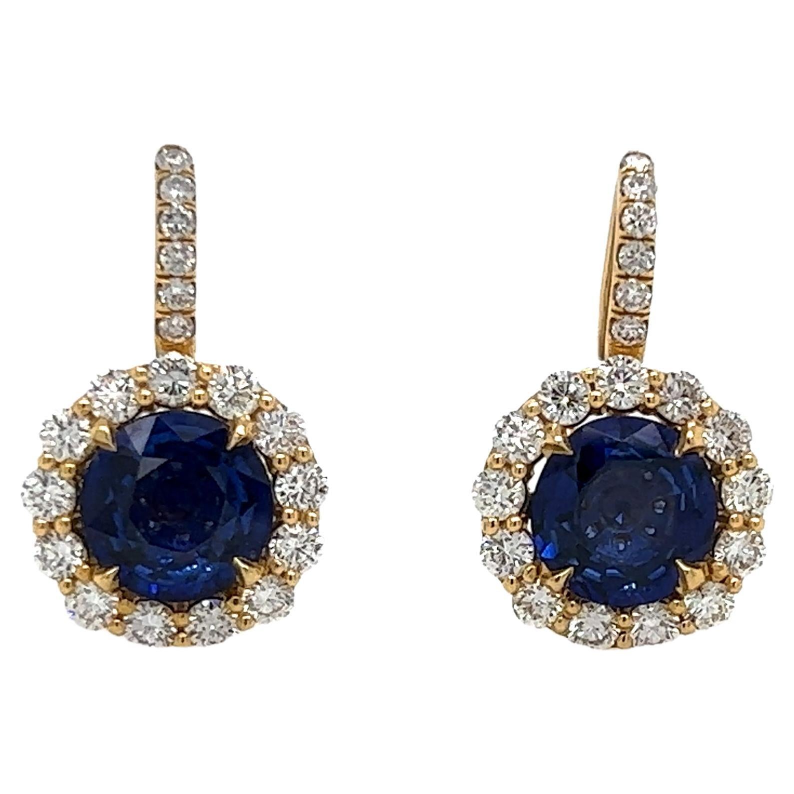 6.23 Total Carat Blue Sapphire and Diamond Halo Pave Earrings in 18K Gold