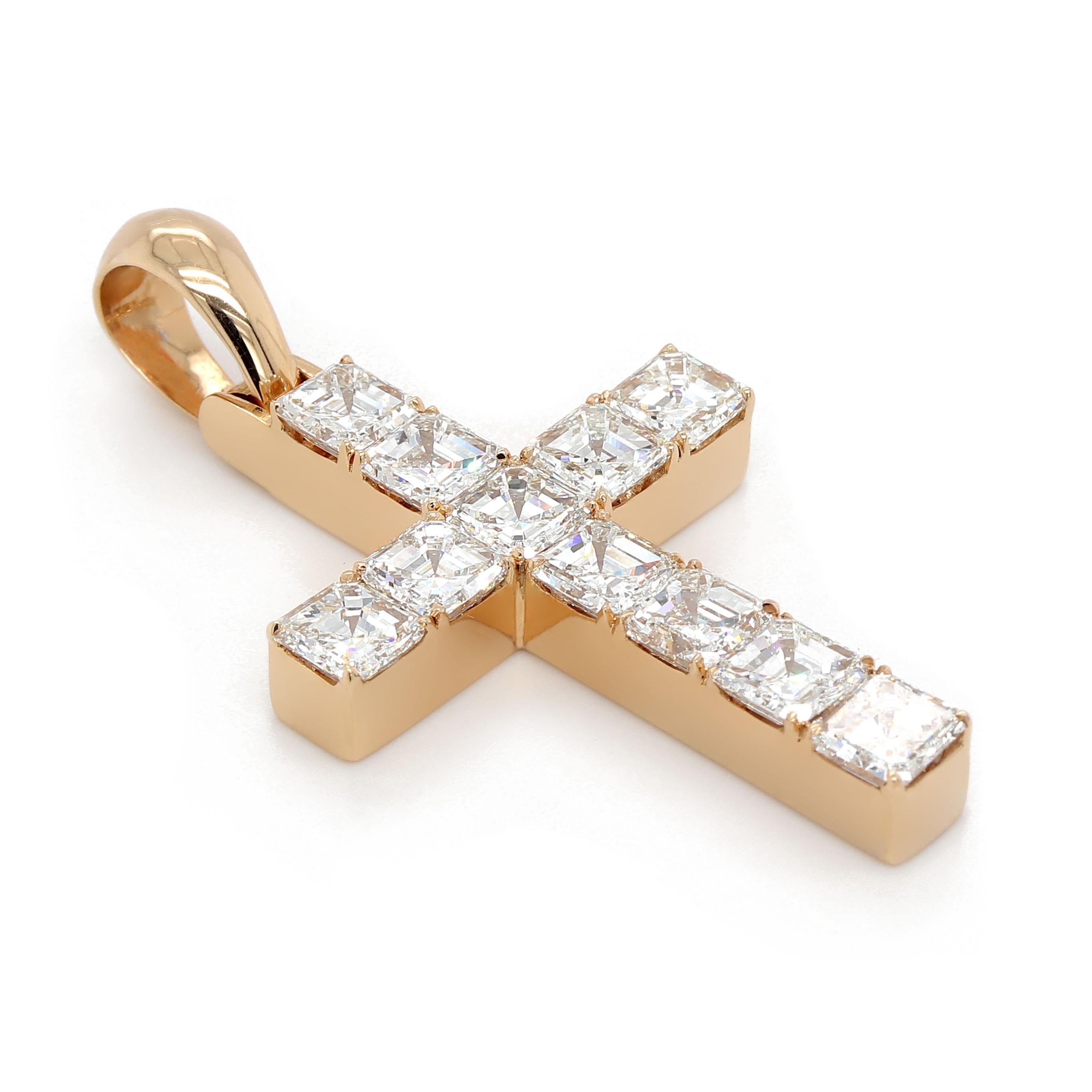 Cross Pendant with 11 asscher cut diamonds of about 6.24 carats with a clarity of VS and color E. Diamonds are set in an 18k  yellow gold pendant. The pendant weighs approximately 10.92 grams.