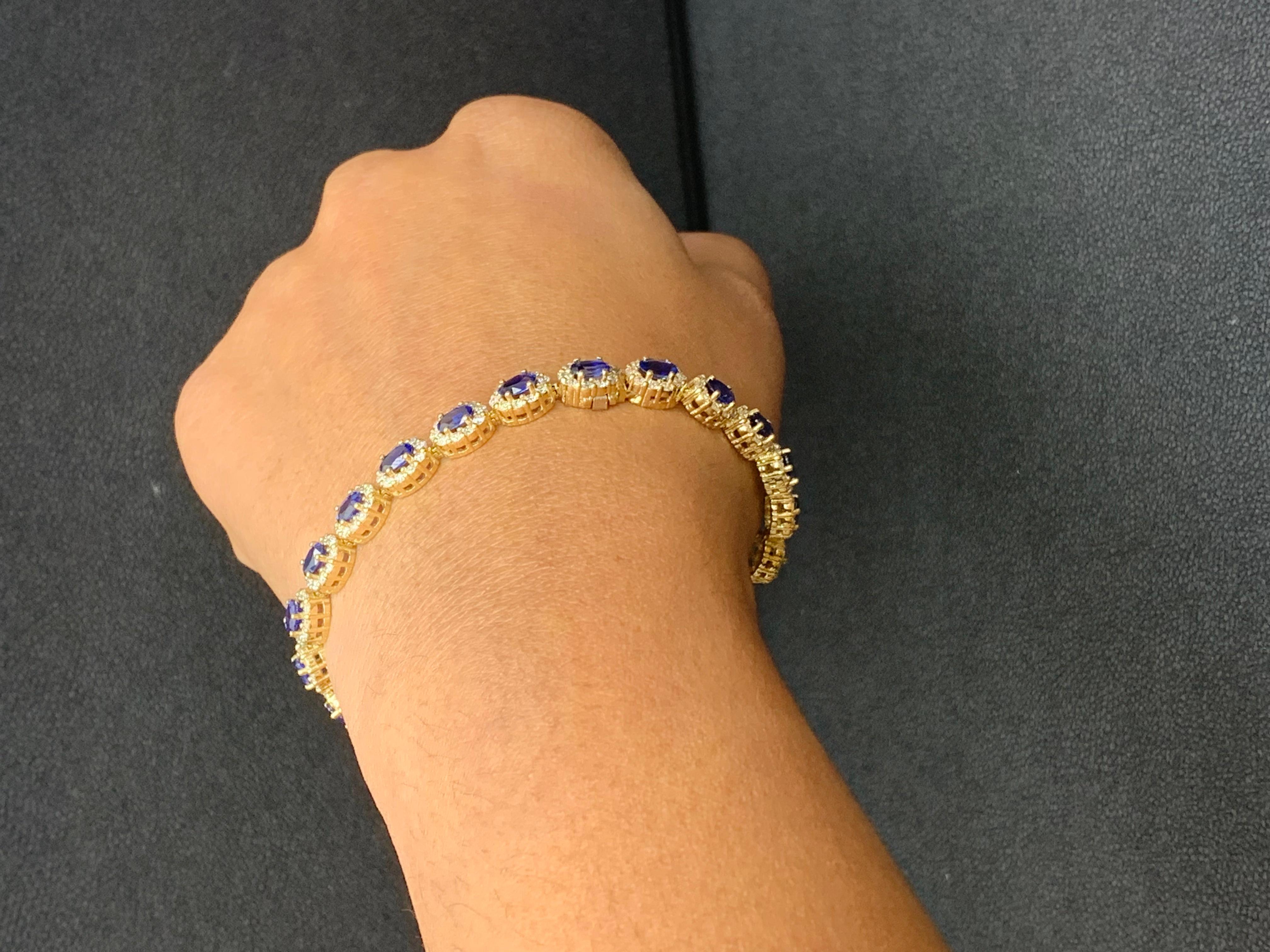 6.24 Carat Oval Cut Blue Sapphire and Diamond Halo Bracelet in 14K Yellow Gold In New Condition For Sale In NEW YORK, NY