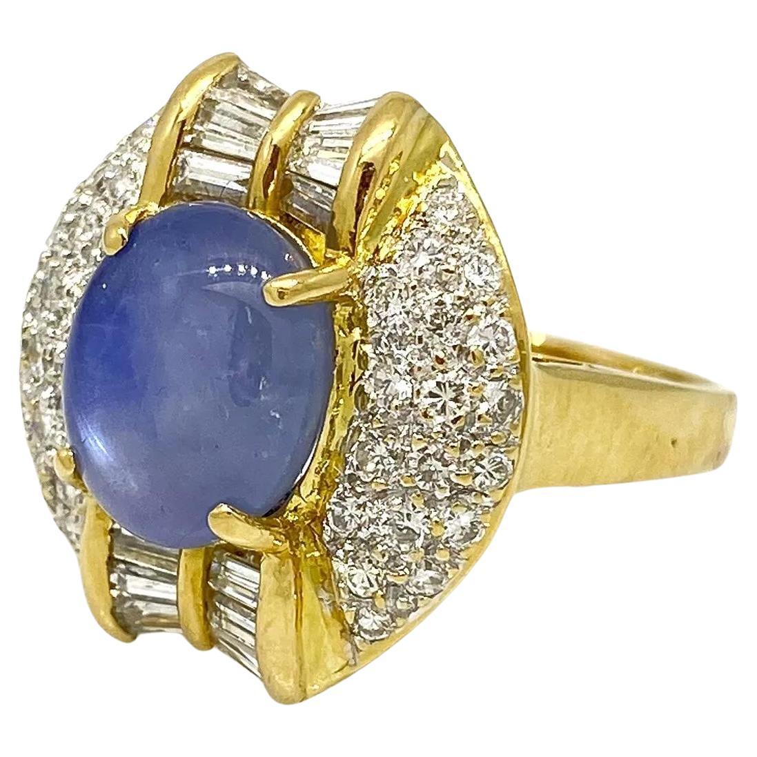 6.24 carat Oval Star Sapphire with Pave Diamonds in 18k Yellow Gold