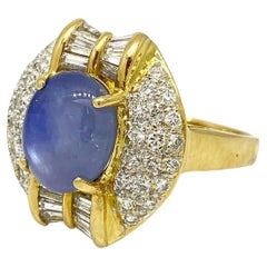 6.24 carat Oval Star Sapphire with Pave Diamonds in 18k Yellow Gold