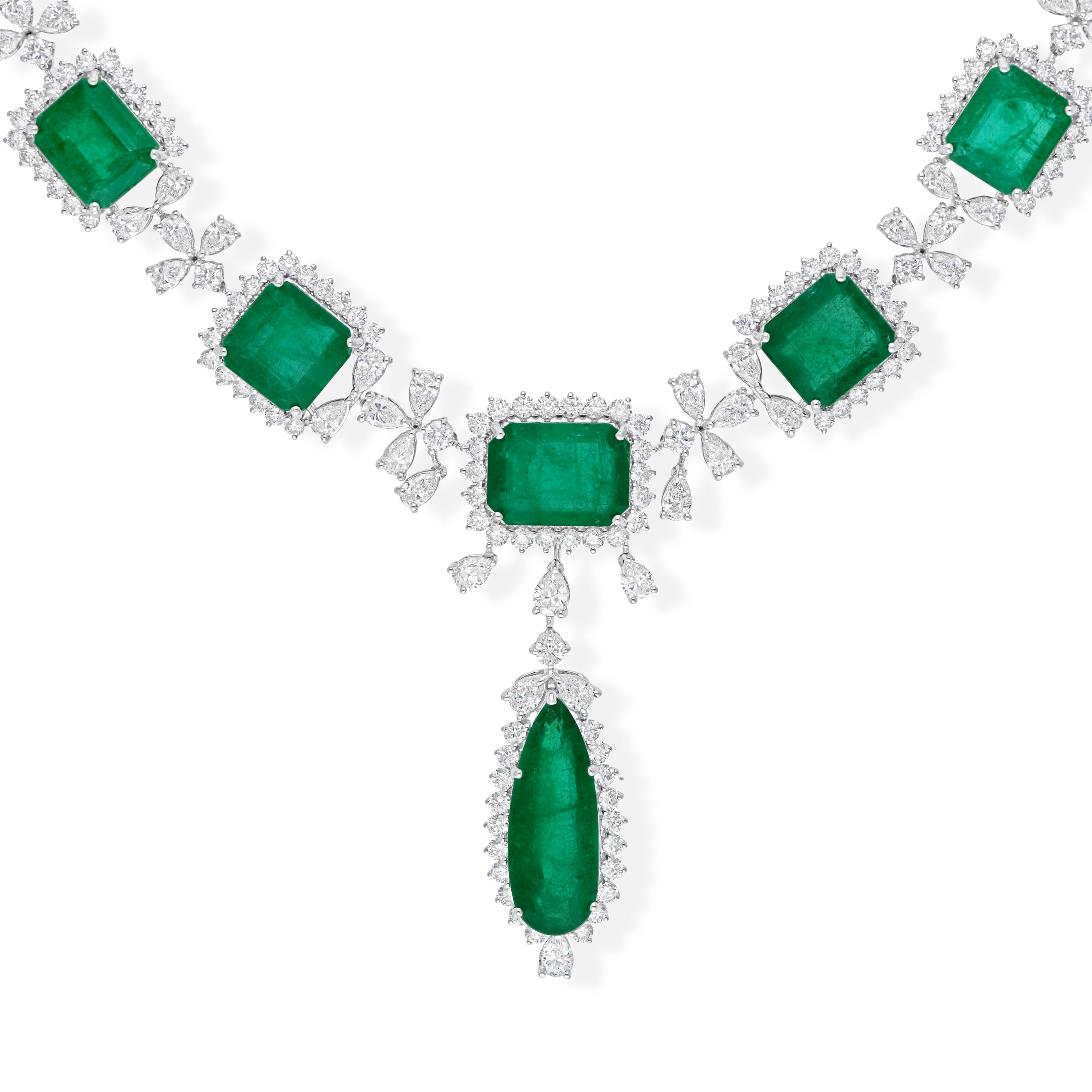 Cast from 18-karat gold, these exquisite necklace is handset with 62.42 carats Zambian emerald and 17.93 carats of sparkling diamonds.

FOLLOW SPECTRUM JEWELS storefront to view the latest collection & exclusive pieces. Spectrum Jewels is proudly