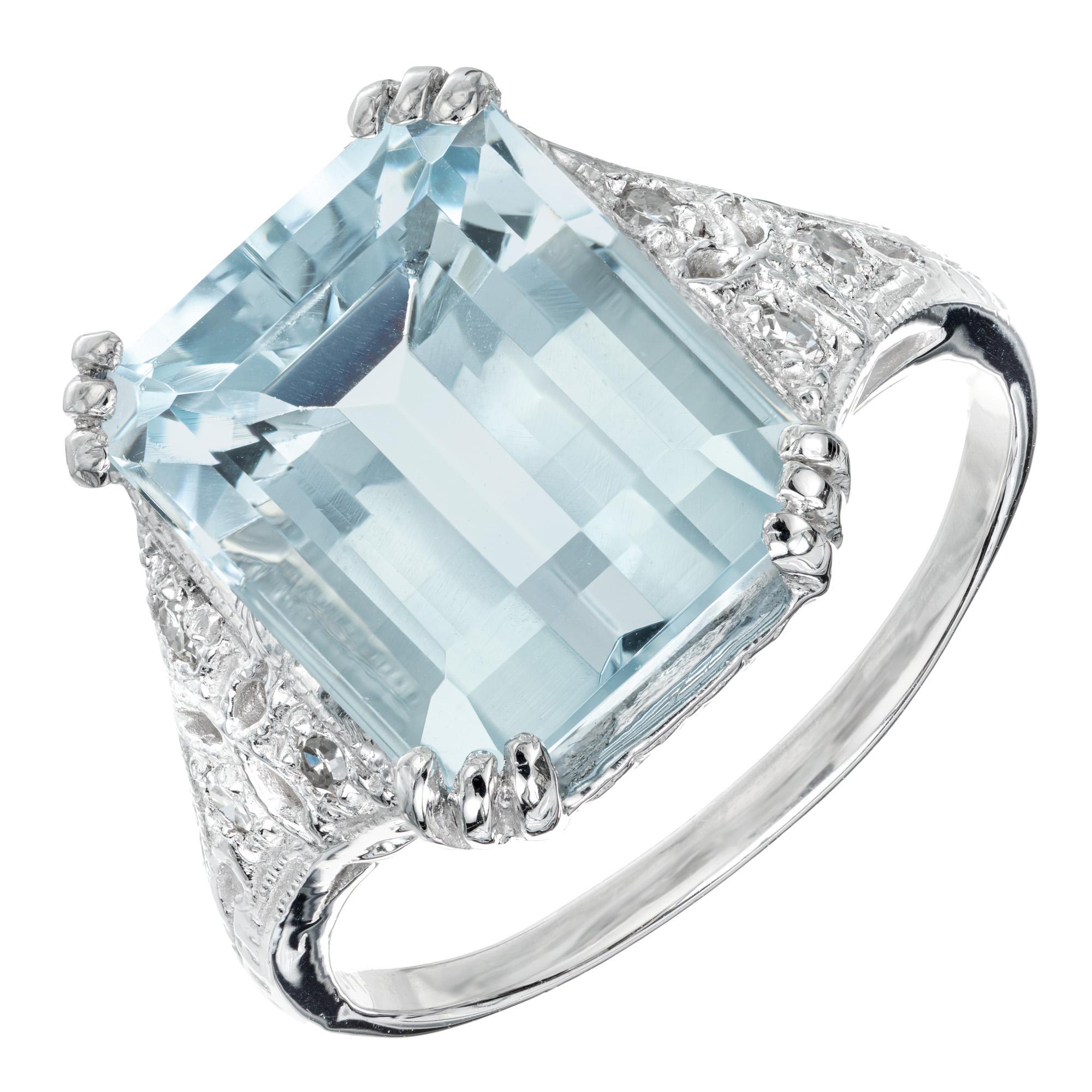  Art Deco 1920s aquamarine and diamond ring. 6.25 emerald cut center stone with 6 single cut accent diamonds, three on each side of the pierced and engraved platinum setting. 

1 Emerald cut bright light blue Aquamarine, approx. total weight