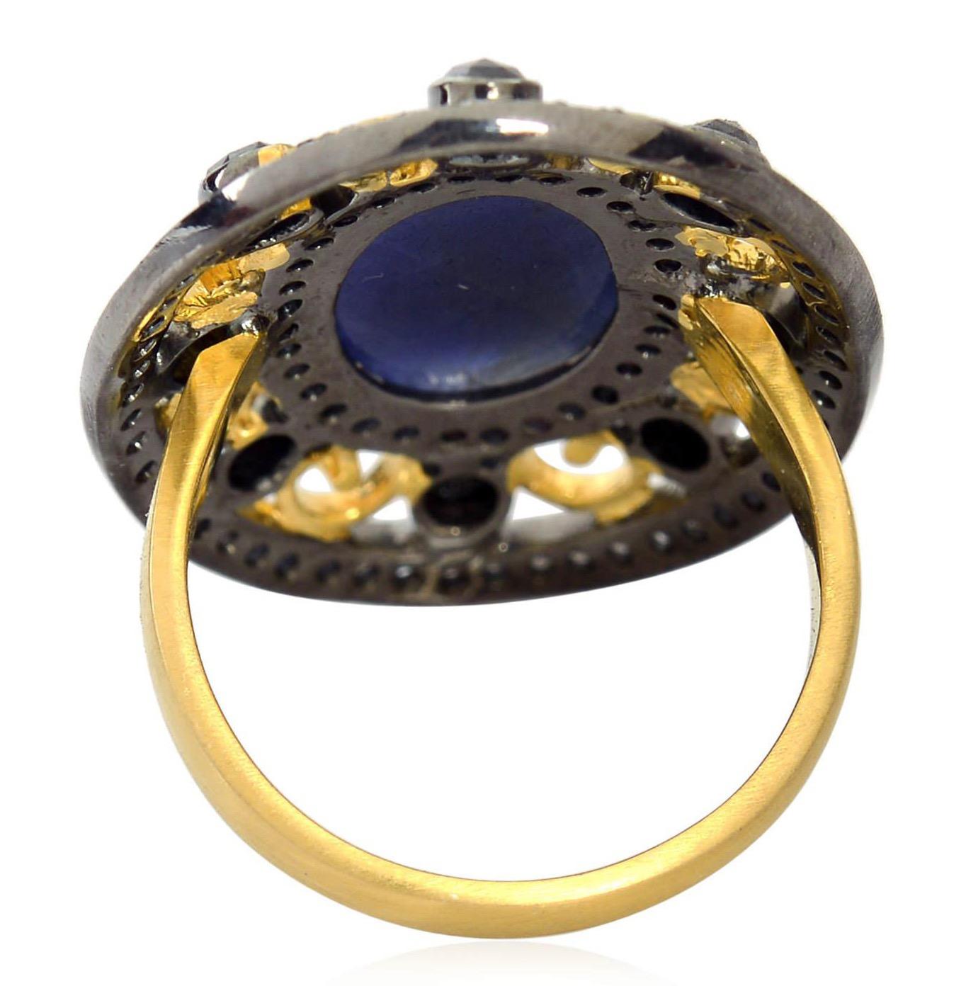 This ring has been meticulously crafted from 18-karat gold & sterling silver with blackened finish. Handcrafted in 6.25 carats sapphire & illuminated with 1.57 carats diamonds. 

The ring is a size 7 and may be resized to larger or smaller upon