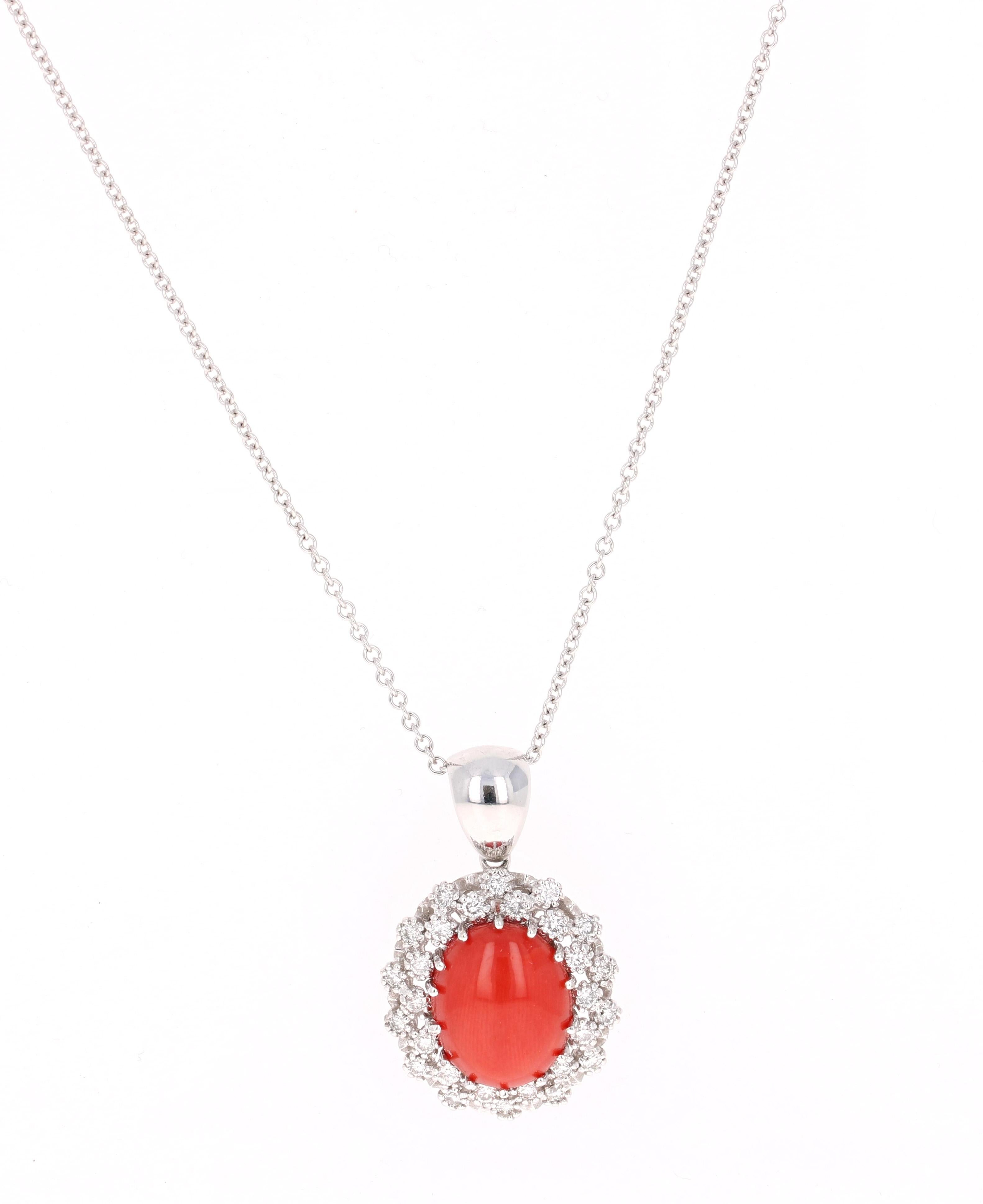 A stunning Coral and Diamond Chain Necklace

This one of a kind beauty has a magnificent 5.46 Carat Oval Cut Coral. It is surrounded by 28 Round Cut Diamonds that weigh 0.79 Carats.  The total carat weight of the pendant is 6.25 carats.

The pendant