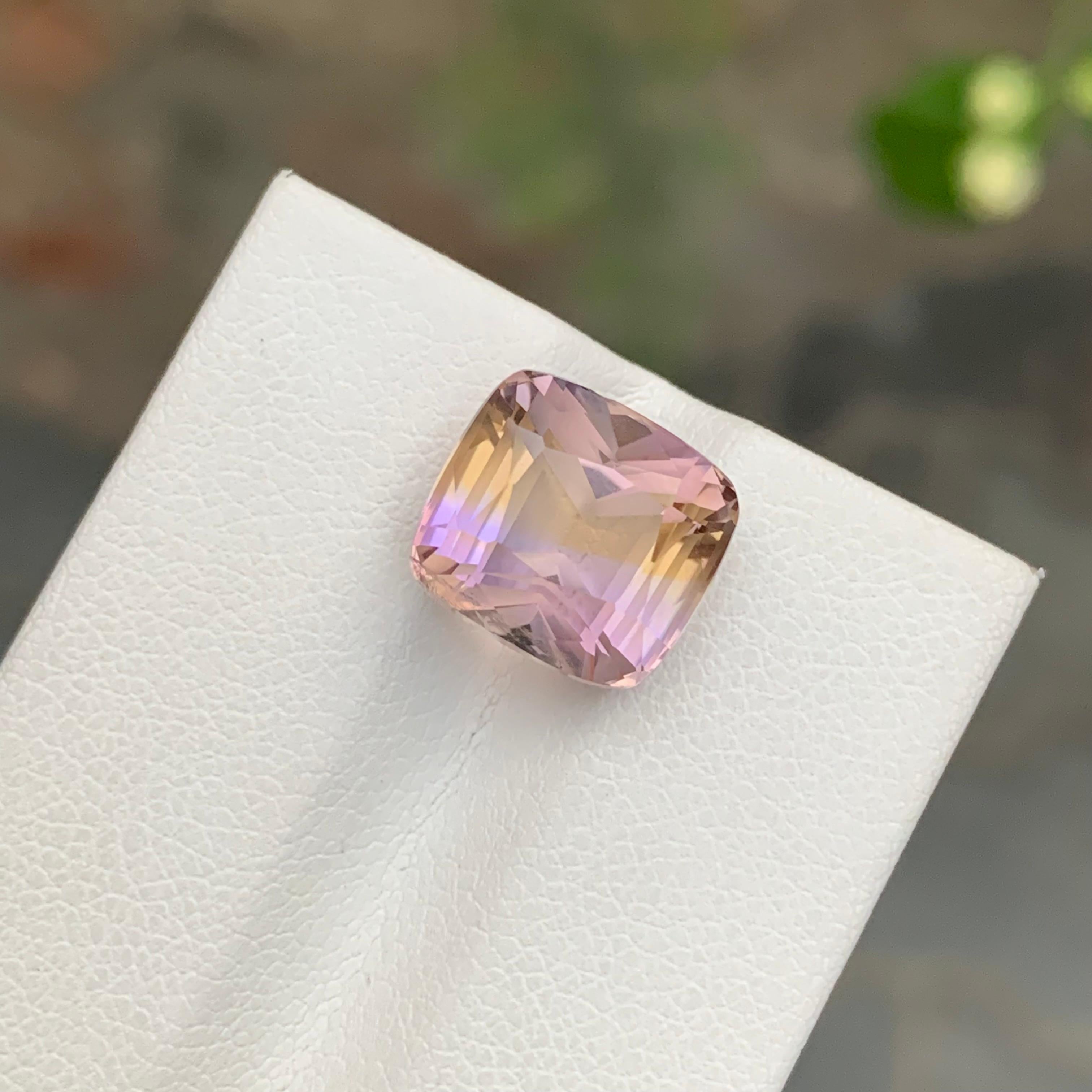 Faceted Ametrine

Weight: 6.25 Carats
Dimension; 10.9 x 10 x 8.3 Mm
Origin: Brazil
Color: Purple & Yellow
Shape: Cushion 
Treatment: Non
Certficate: On Demand
.
Ametrine is a unique and captivating gemstone that displays a harmonious blend of two
