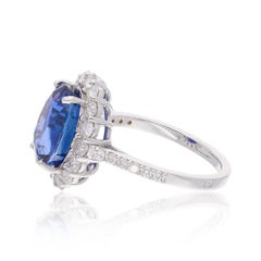 6.25 Carat Oval Blue Sapphire Ring 1.05 Carat SI/H Diamond 18 Karat White Gold