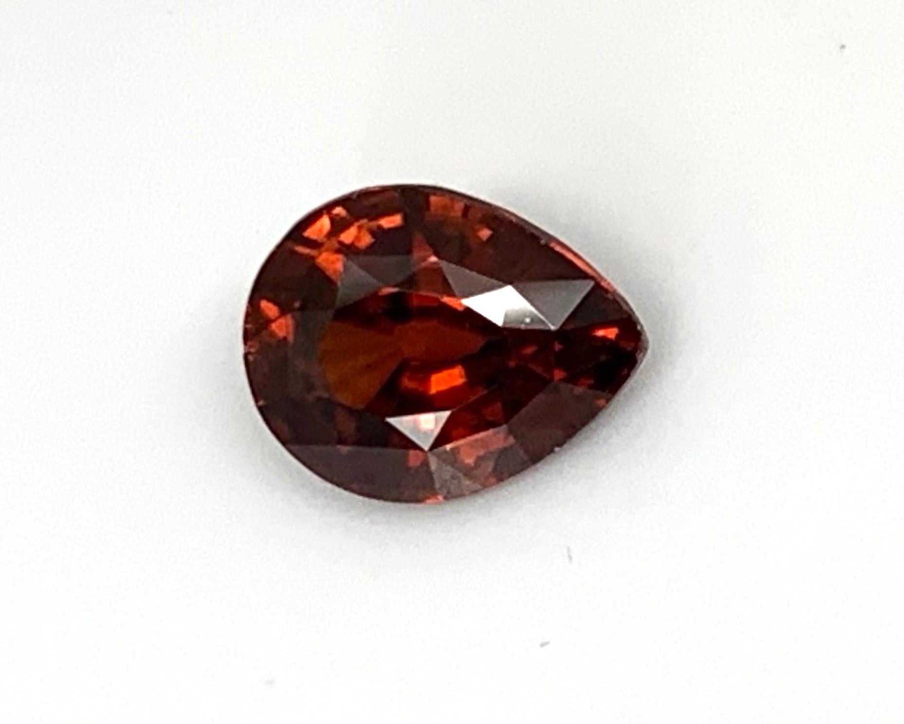 This lovely pear shaped zircon is perfectly shaped and has a strong, reddish orange color. Zircon is more commonly recognized for its bright blue shades, but this December birthstone occurs in a rainbow of colors, including rich earth tones. Prized